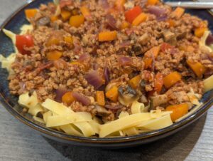 Plant-based bolognese with soy mince by Phe Ledwel, Nuritional Therapist at Eat More Plants