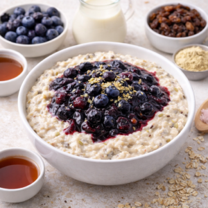 Creamy Vegan Porridge with Blueberry Compote by Phe Ledwell, plant-based Nutritional Therapist
